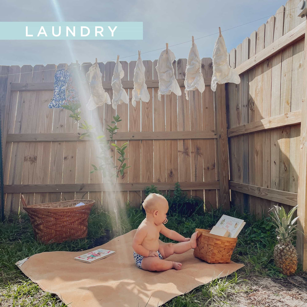 inner and outer cloth diapers folded in a laundry basket