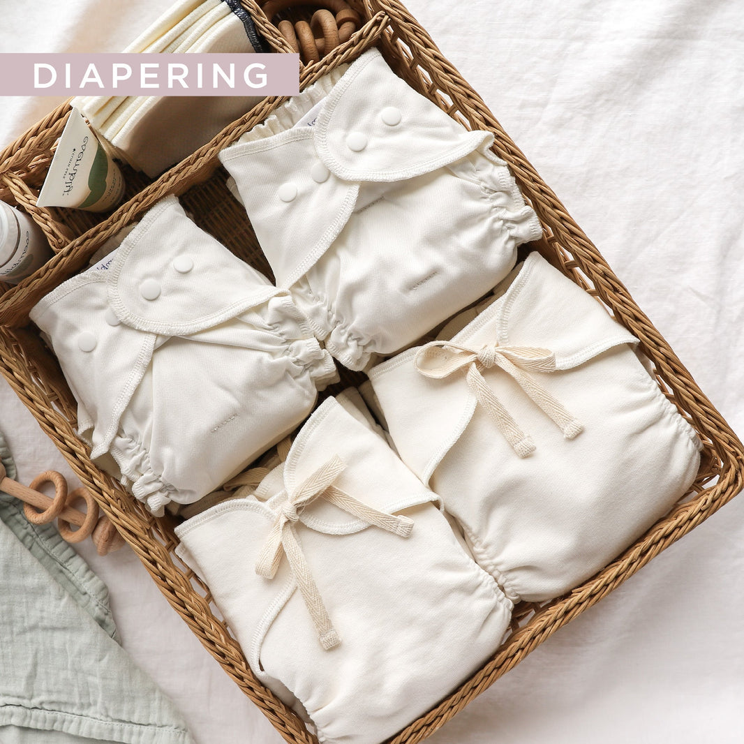 Cloth Diapers with Ties and Snaps in Basket