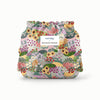 Back view of Esembly Outer in Botanic Garden (colorful florals hand painted by illustrator Sara Boccaccini Meadows)