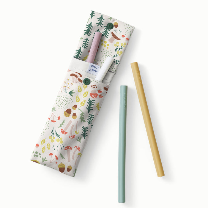 A Fantastic Fungi print (an off-white background with colorful mushroom, trees, and leaves illustrations) straw pouch with off-white accents holding light purple, white, light green, and muted yellow silicone straws