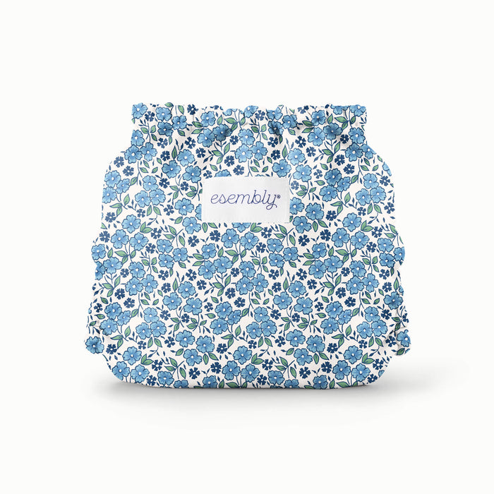Back view of a blue floral Esembly Outer in Forget-Me-Not
