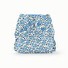 Front view of a blue floral Esembly Outer in Forget-Me-Not