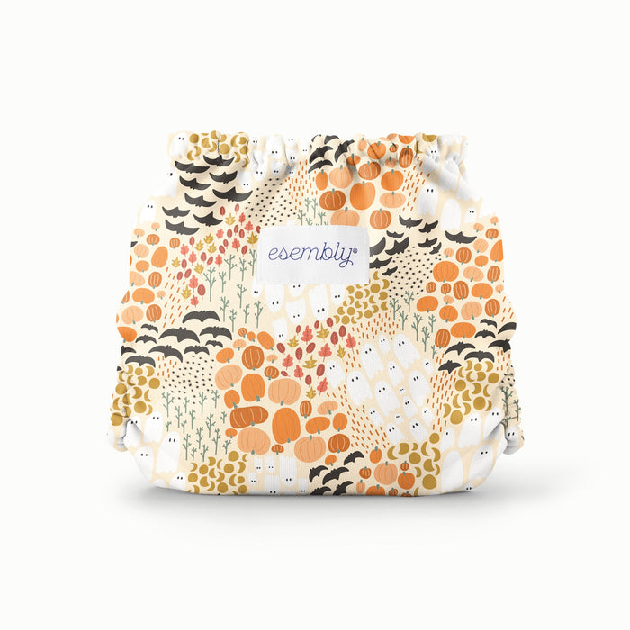 Back view of Esembly's Pumpkin Patch print (light orange background with ghosts, moons, pumpkins, bats, and fall foliage) on an Outer.