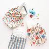 Ditty Bags in Jana Glatt prints holding diapers, wipes, and wipe up wash