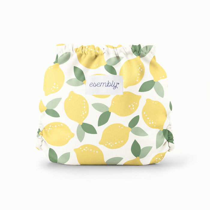 Reusable cloth diaper with lemon pattern on a white background