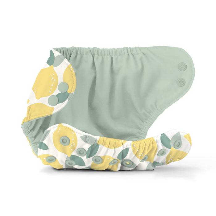 Lemon pattern \ed diaper with a green interior on a white background