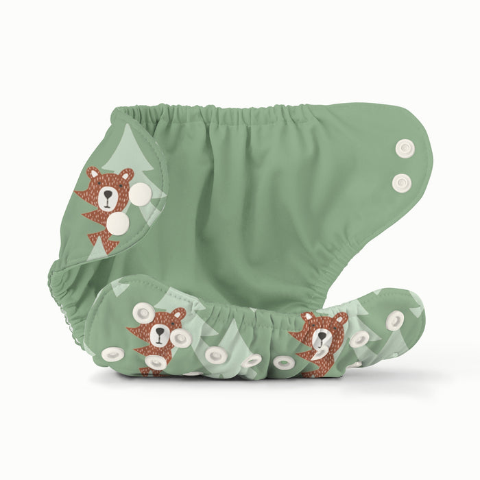 Open view of Esembly Outer in Peek-A-Bear (mid-tone and light green trees in the background with illustrated brown bears peeking out)