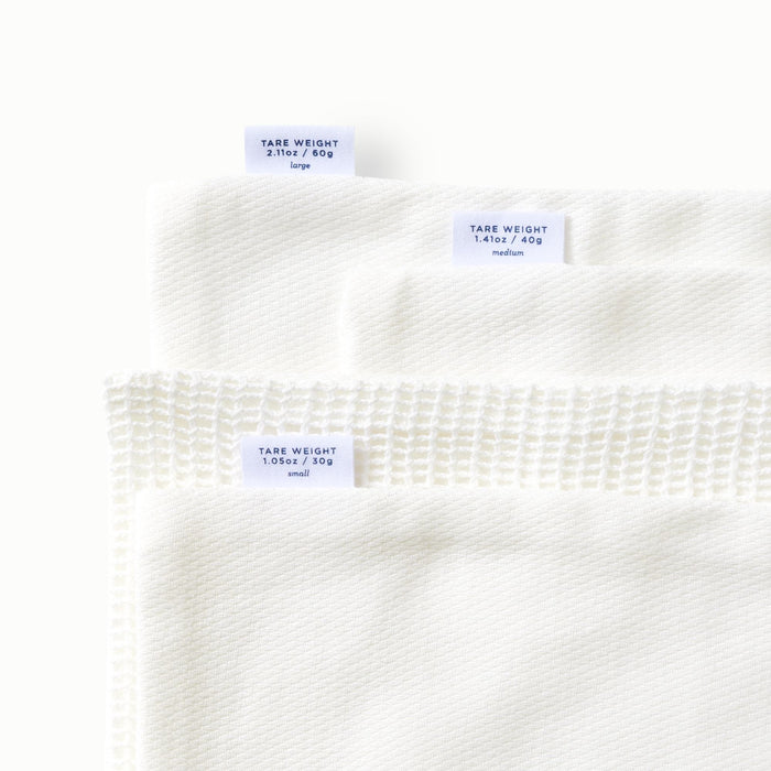 View of Tare tags on four produce savers