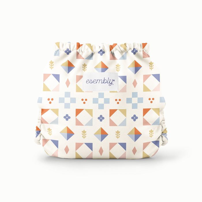 Back view of Quilted Outer - a colorful geometric pattern on a white background