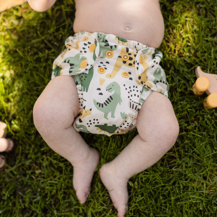Front view of a baby wearing a Roar! Outer