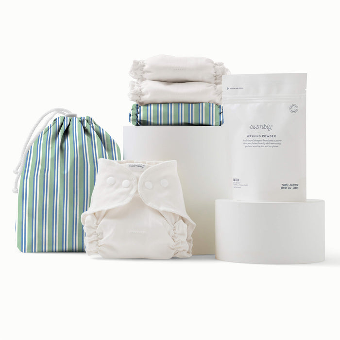 A Try it Kit in Sunday Stripe — blue, green, and white stripes — with Inners and Washing Powder