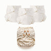 An Outer with caramel checks on a cream background with three Inners