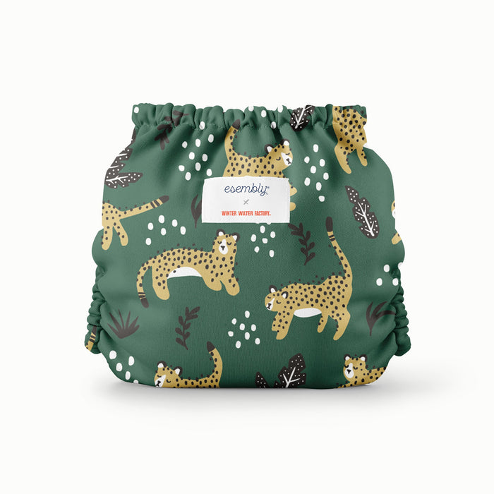 Back view of Esembly Outer with a dark green background with yellow wildcat print and sporadic white dots