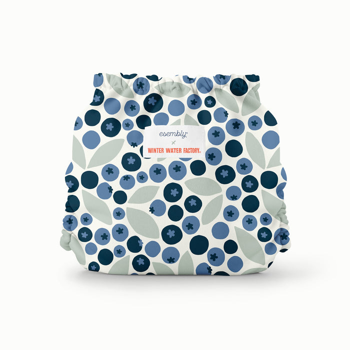 Back view of Esembly Outer in a white background with dark navy blue and light blue blueberries with light green leaves
