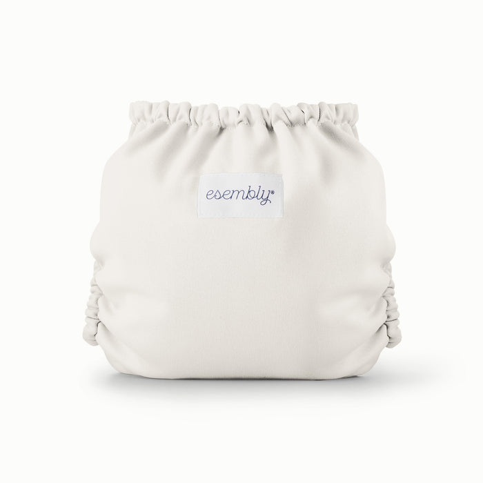 Back view of Esembly Outer in an off-white cream color