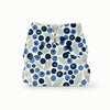 Front view of Esembly Outer in a white background with dark navy blue and light blue blueberries with light green leaves