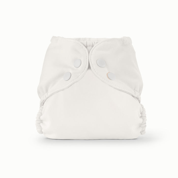 Front view of Esembly Outer in an off white cream color