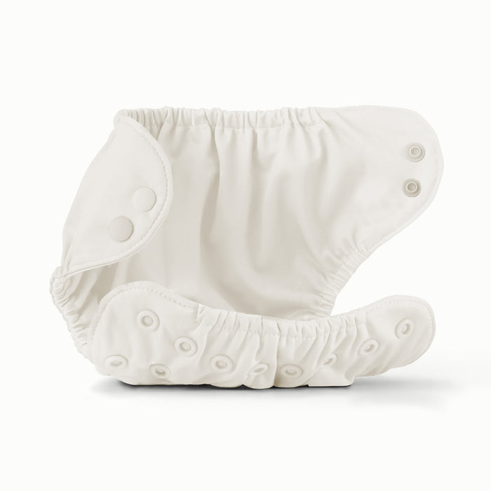 Open view of Esembly Outer in an off-white cream color with an interior with an off-white cream color