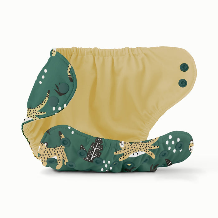 Open view of Esembly Outer with a dark green background with yellow wildcat print and sporadic white dots and a yellow interior