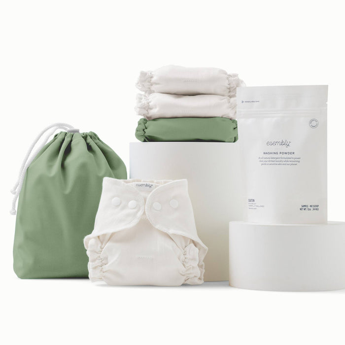 Waterproof Ditty Bag and Outer in Aloe (a mid-tone green), 3 White Cotton Inners, and a sample size bag of Washing Powder